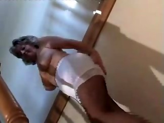 Agreeable Granny In Dark Hose Toying On The Steps